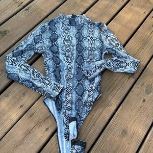 Long sleeved snake skinned bodysuit